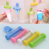 Toothpaste Squeezer Rolling Dispenser Holder